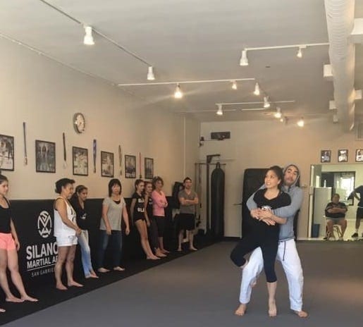 Professor Gino and his assistent Anna showing a Self-Defense technique at the Self-Defense seminar