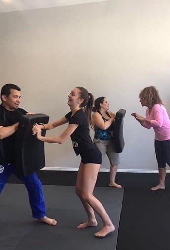 Students helping at the Jiu-Jitsu Self-Defense Seminar