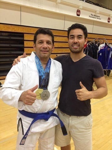 Law Enforcement Office Chris at the BJJ Tour wearing the 2 medals he won with Professor Gino.