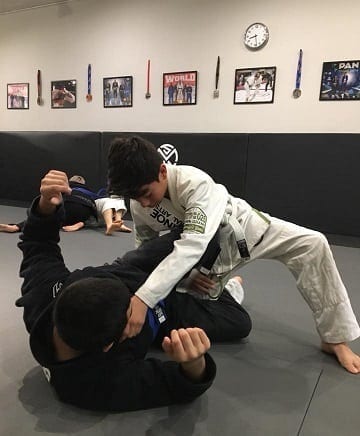 Jiu-Jitsu kids student James passing guard