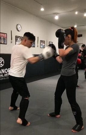 BJJ and Muay Thai Student Ken working his Kickboxing combination