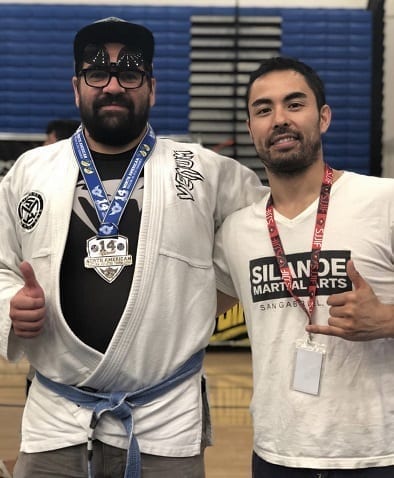 Silanoe Jiu-Jitsu student Dave Hall with Prof Gino showing his silver medal