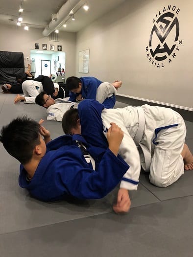 Ethan showing the Triangle Choke submission in Brazilian Jiu-Jitsu at Silanoe