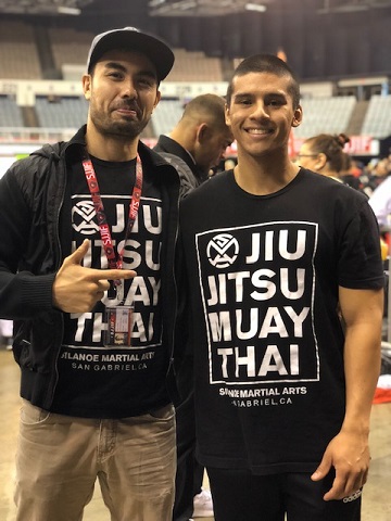 Josh at a BJJ competition with Prof Gino