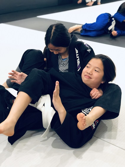 Teen Jiu-Jitsu student Faith trains with Sandra at Silanoe San Gabriel Alhambra