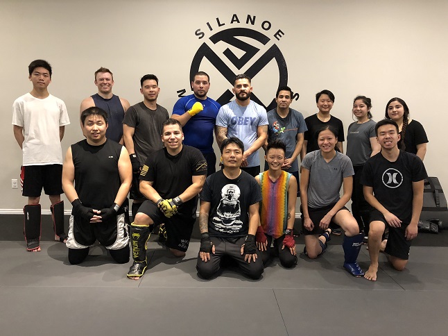 Rebecca and the other Muay Thai Kickboxing students in a group picture at Silanoe San Gabriel Alhambra