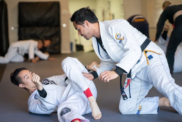 Professor Gino with Ivan Giang from Monterey Park working on Jiu-Jitsu guard 