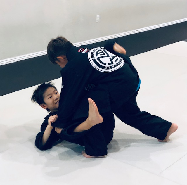 BJJ guard play by Kids Student Matty C. at Silanoe Martial Arts