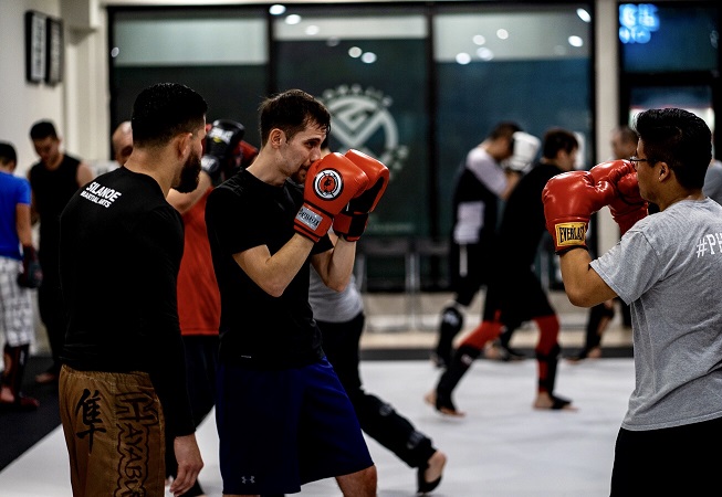 Paul Rocha in the Muay Thai Kickboxing striking class at Silanoe Martial Arts in San Gabriel