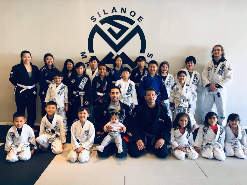 A more recent kids BJJ 1 and 2 group picture with student of the month Charles K. in the middle.