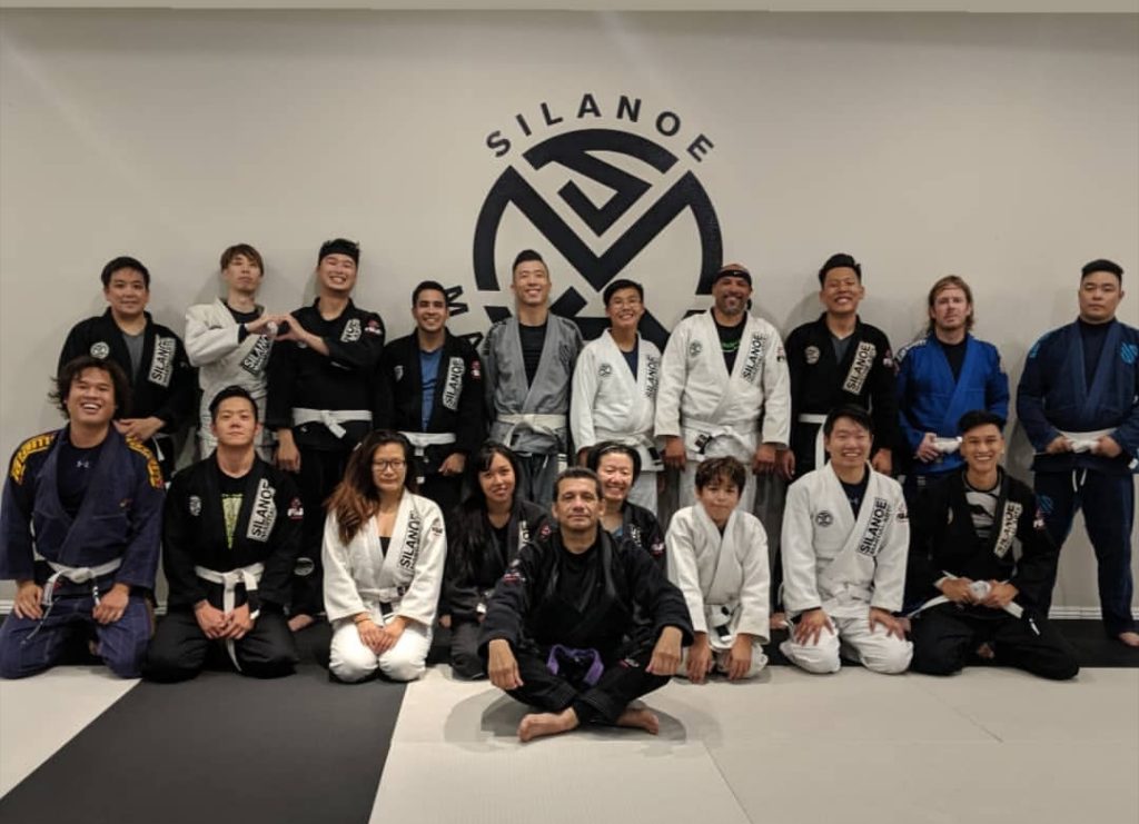 The BJJ Fundamentals group class with Sean Lee in the center under supervision of coach Chris.