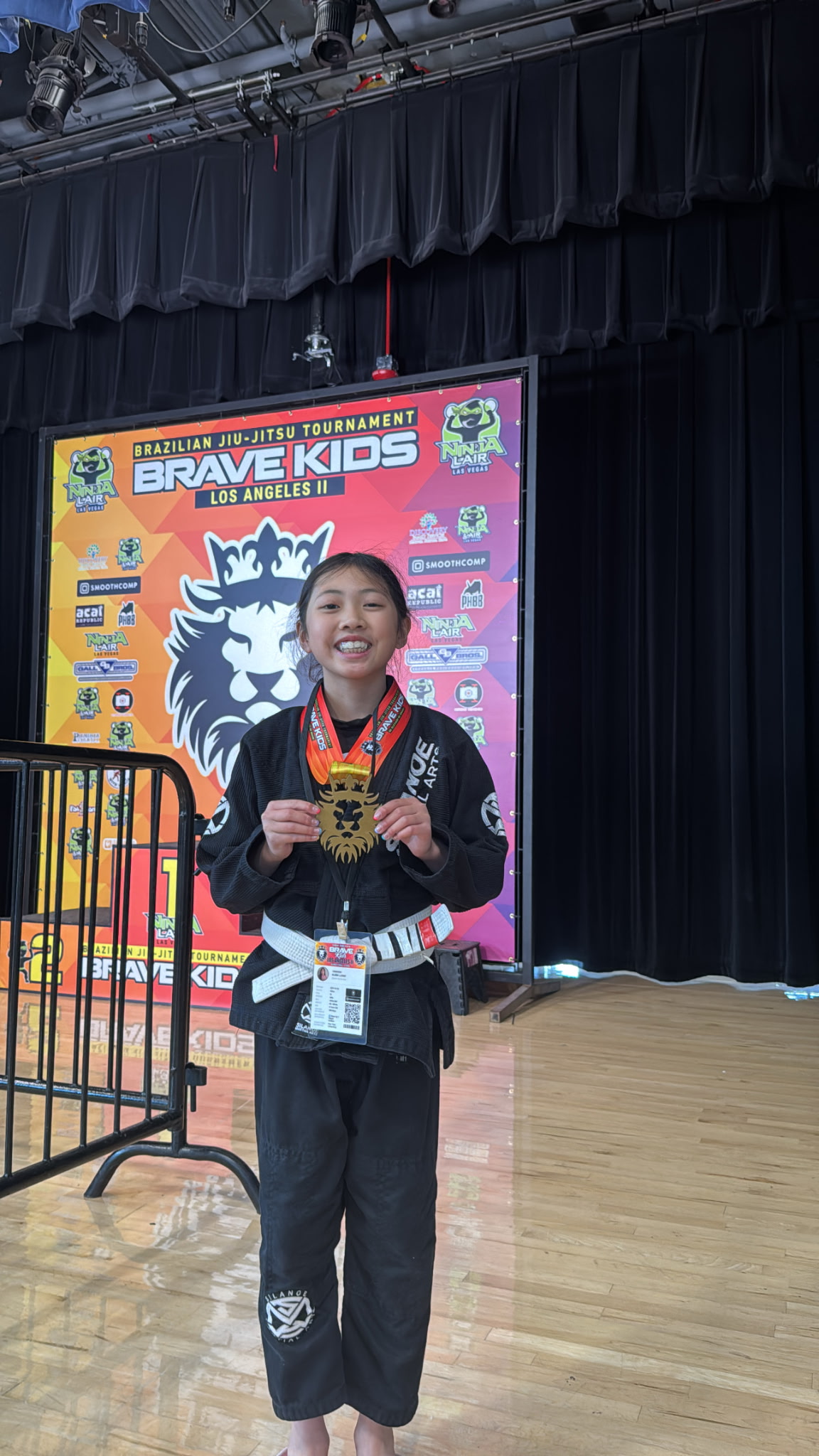 1123070212970159798 Alana L. student of Silanoe Martial Arts San Gabriel showing her gold medal at her first competition at Brave